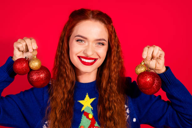 istock Photo of shiny attractive lady dressed ornament pullover rising x-mas decorations empty space isolated red color background 2184528196