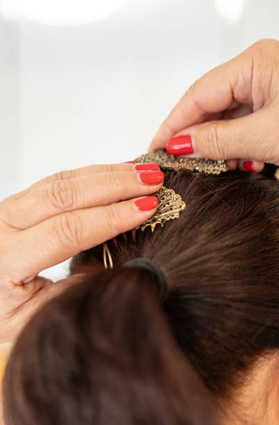 istock Woman Adjusting Decorative Hair Comb 2184531931
