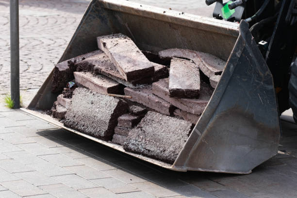 istock Excavator bucket filled with stones 2184536164