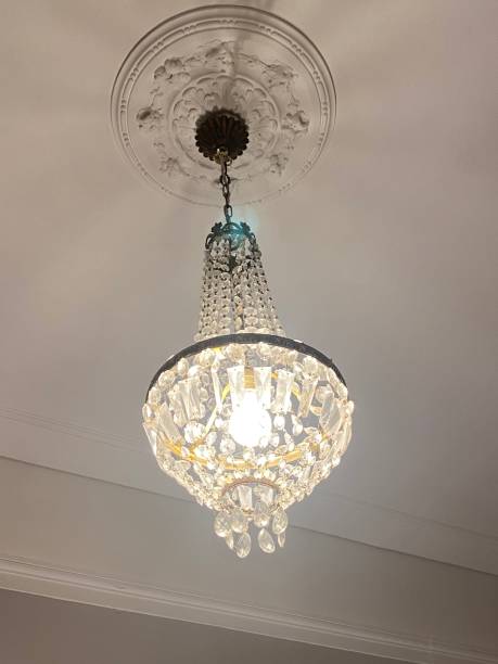 istock Prism chandelier and stucco. 2184554941