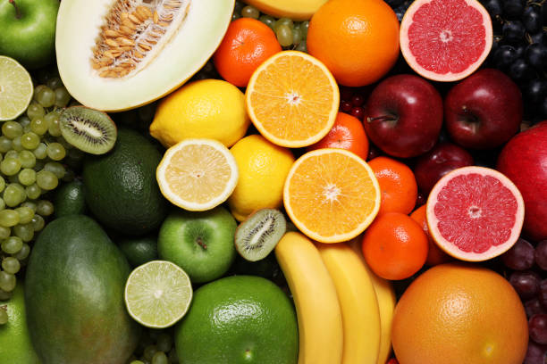 istock Many different fresh fruits and grapes as background, top view 2184565084