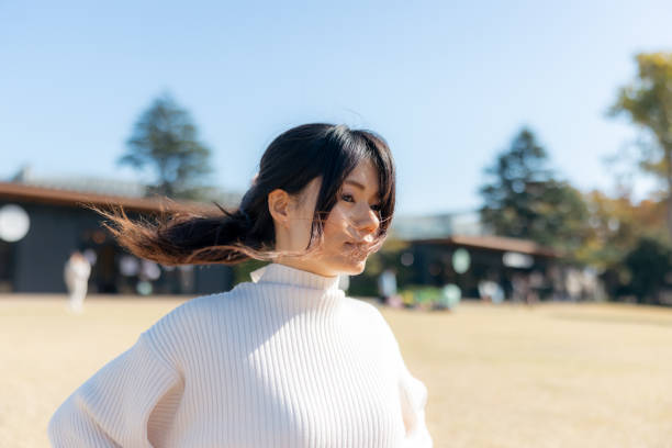 Woman looking at view in public park