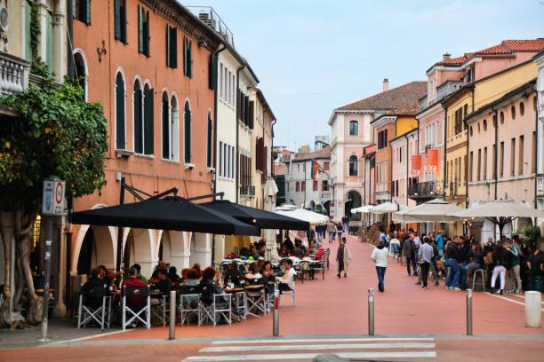 People visit Via Palazzo in Mestre district of Venice, Italy. Mestre is the main land part of Venice.