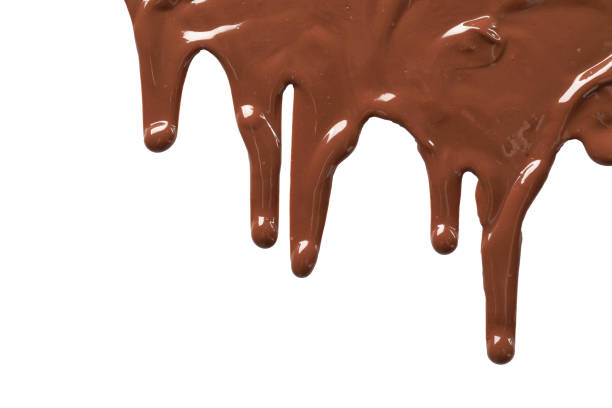 istock Tasty melted milk chocolate pouring down on white background 2184569531