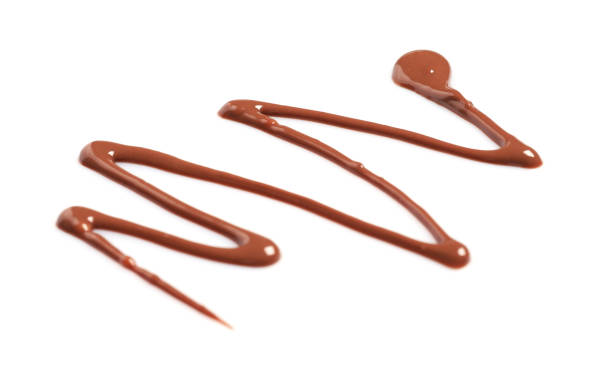istock Smear of tasty milk chocolate paste isolated on white 2184569546