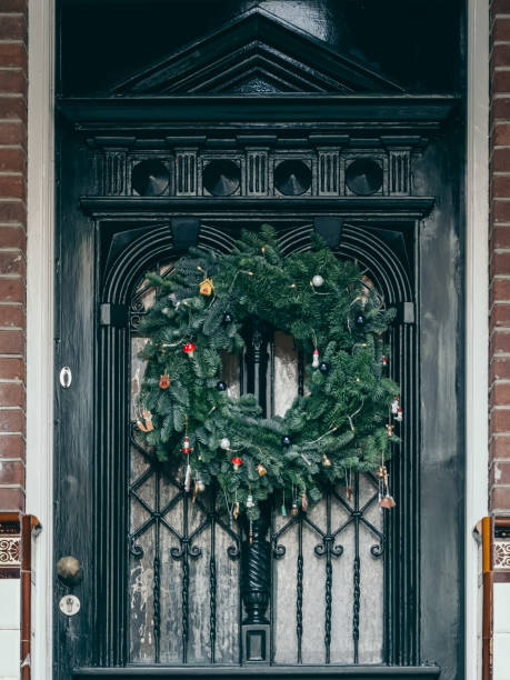 istock Beautiful Christmas wreath on the door 2184569620