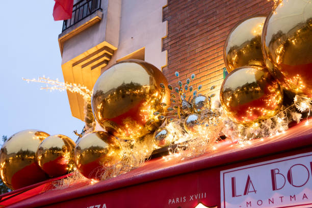 Paris - 7th November 2024, early morning. La Boheme cafe/restaurant in Montmartre is decorated for Christmas. The decorations were finished that morning.