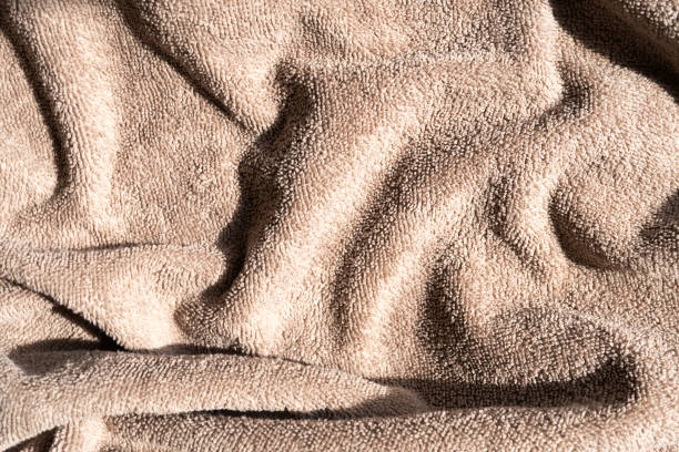 istock Brown terry towel close-up 2184573956