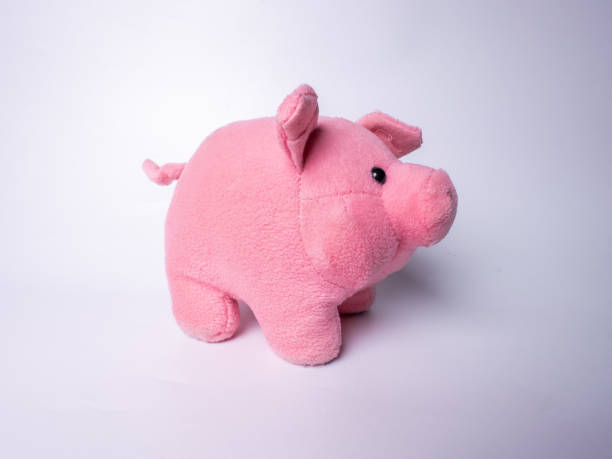 istock A cute pink plush pig toy with soft fabric and a friendly design 2184578251
