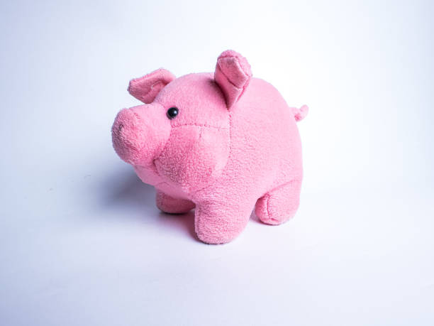 istock A soft pink plush pig toy with a cute and friendly appearance 2184578262