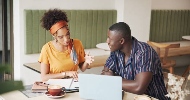 istock Creative people, documents and laptop for meeting, internet agency and contract for coffee shop research. Cafe, entrepreneur or brand consultant for project, proposal or remote work online startup 2184579314