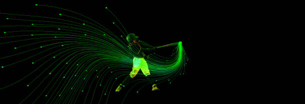 istock Focused man, baseball player during intense game, hitting ball with bat on dark background with futuristic neon elements. 2184580295