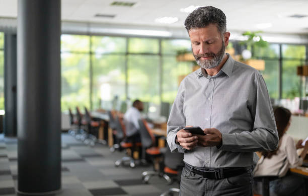 istock Businessman With Smart Phone 2184581947