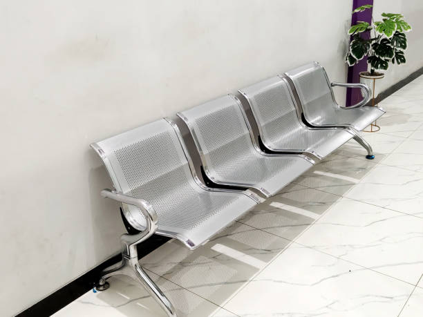 istock A row of chairs in a waiting room. 2184582674