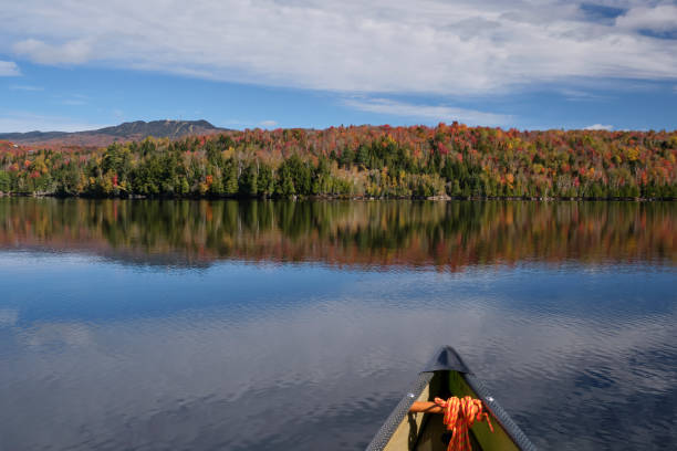 istock Fall colors and Mont Tremblant from canoe 2184585989