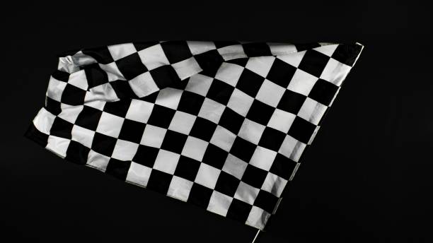 istock Checkered Racing Flag against Black Background. 2184599663