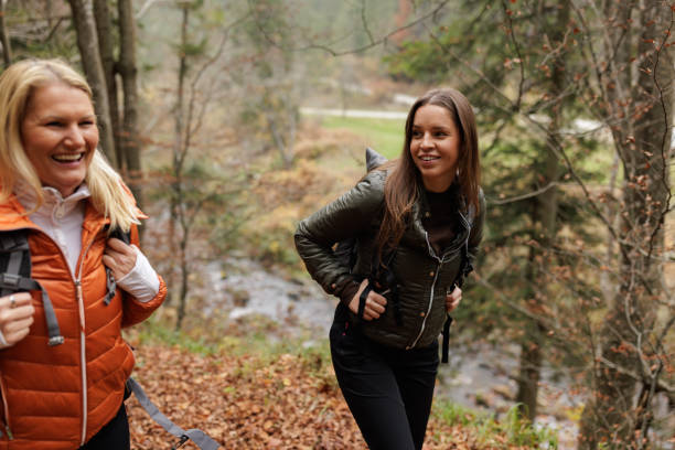 Young women taking selfie among nature
