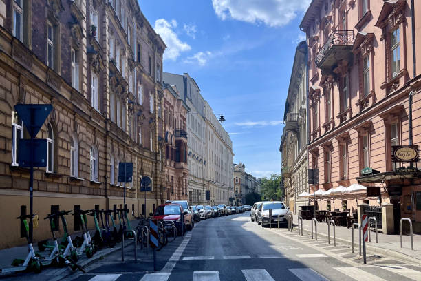Krakow, Poland - July 27, 2024 : View of cars parked in line on street side