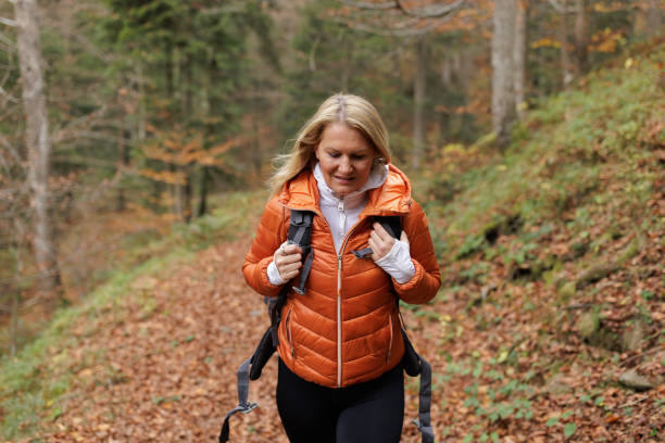 istock Woman Enjoying a Peaceful Hike Through the Forest 2184601961