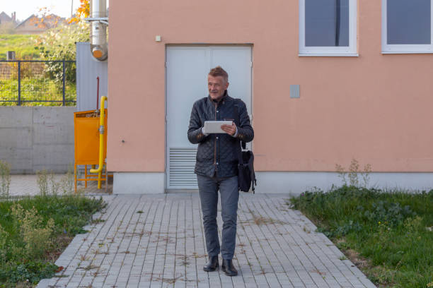 istock Man Using digital tablet In Outdoor Urban Environments 2184606624