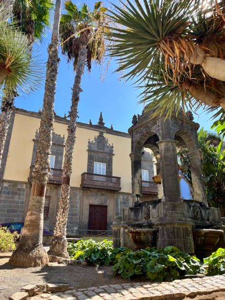 istock Colorful ancient landscape view with typical colonial style building with iron balcony in main square against blue sky in Las Palmas de Gran Canaria, Canary Island, Spain. 2184607349