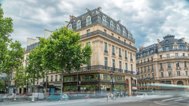 istock Opera square timelapse with traffic. It was built at the same time as the Opera Garnier in Paris, France 2184612634