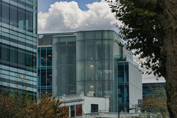 istock Glass Facade Building with Tree in Hammersmith, London 2184612640