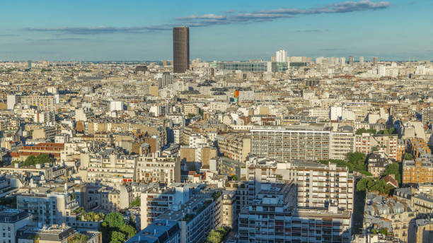 istock Aerial panorama above many houses rooftops in a Paris timelapse 2184612869