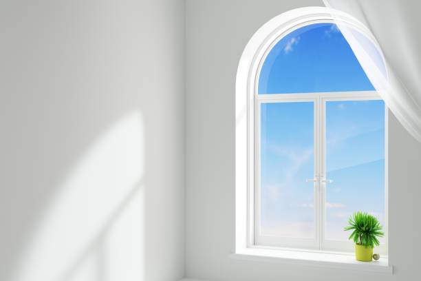 istock White arch plastic window in the room 2184616094