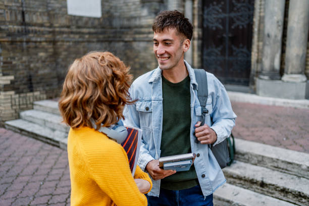 istock Friends chat on university campus during the break 2184618636