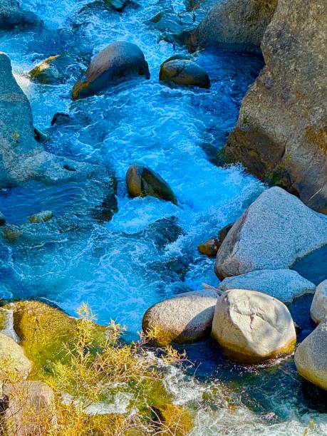 Tower-Roosevelt Region has Tower Falls, Yellowstone River, geologic mountains capes and valleys. Calcite Springs is geothermal altered rhyolite and steep, columnar basalt cliffs on the opposite side of the river.