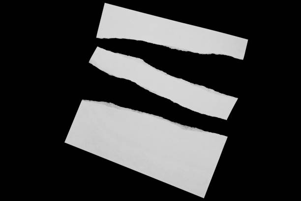 istock Torn White Paper Sheet  Revealing Black Background 2184629534