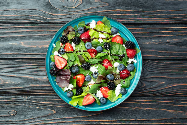 istock Berries salad (blueberry strawberry blackberry ) with cheese feta and balsamic sauce 2184629809