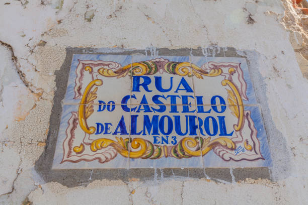 istock A beautifully hand-painted ceramic street sign on a weathered wall 2184630988