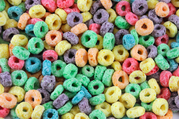 istock Colorful cereal loop rings, breakfast food background 2184633342