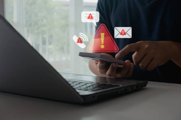 istock Fraud alert or smartphone Scam, System hacked warning alert on mobile. Cyber attack network, Virus, Spyware, Malware, Malicious software. Cyber security and cybercrime. warning notification concept. 2184633973