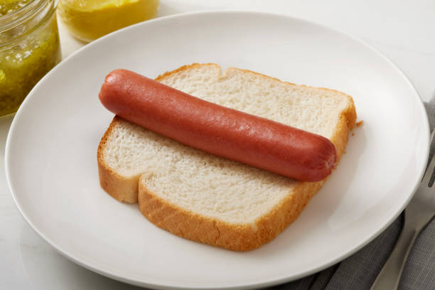 istock Steamed Hot Dog on White Bread 2184634050