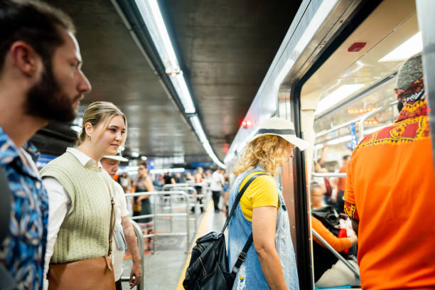 istock People entering in the subway train 2184634101