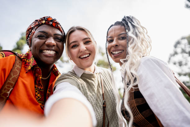 istock Friends taking selfies outdoors - point of view 2184634140