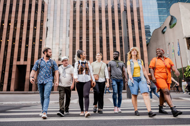 istock Tourists talking while crossing the avenue 2184634227