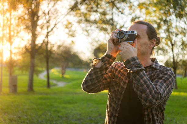 istock Taking photo with analog film camera 2184643101