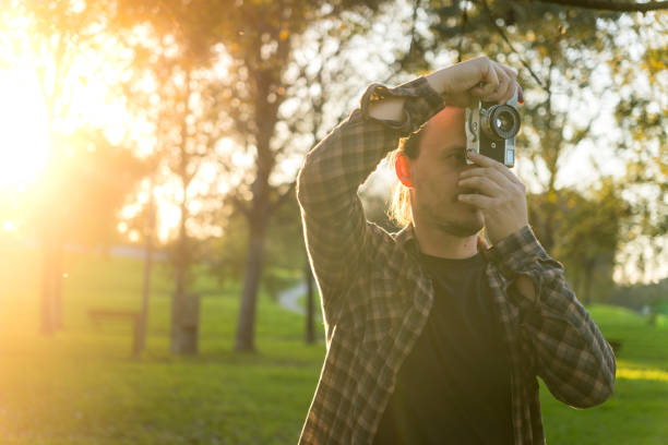 istock Taking photo with analog film camera 2184643146