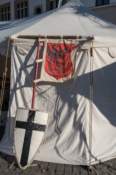 medieval guard for knights and the battle flag in Bistrita, Romania, September 2024