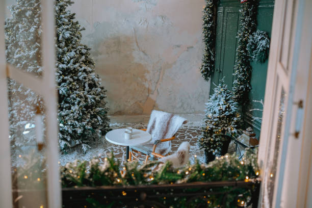istock A cozy winter scene featuring a snow-covered terrace decorated for the holidays 2184646851
