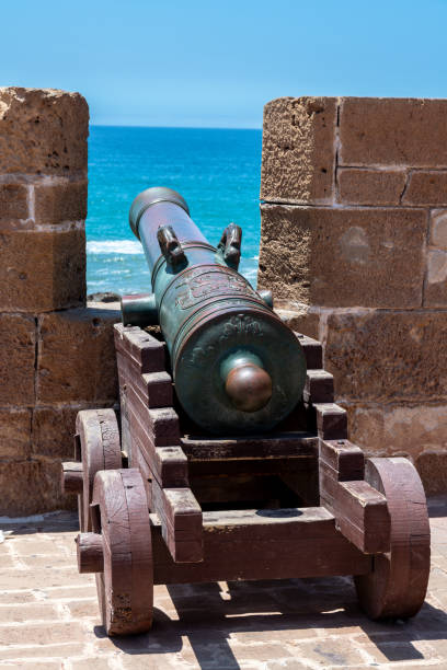 istock Intriguing Close-Up of an Old Cannon with Ocean View. 2184647892