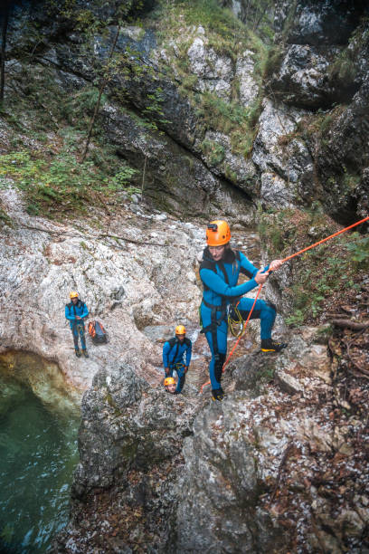 istock Diverse Friends Climbing Up in Canyoning 2184648193