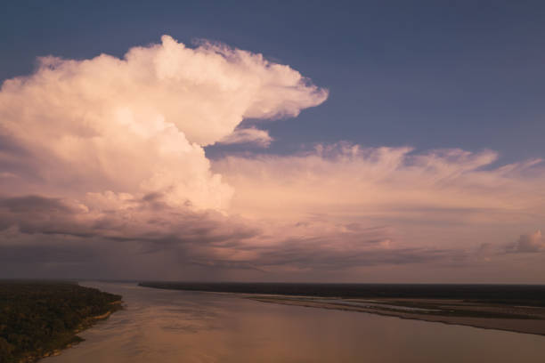 Majestic cloud formation over the Amazon River at sunset