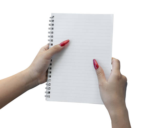 istock Female hand holding notebook paper isolated on white backgroun, clipping path 2184662111