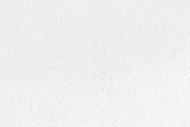 istock White concrete cement wall texture for background and design art work. 2184667605