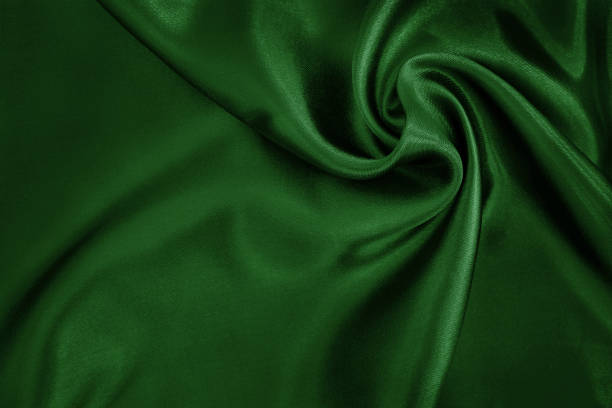istock Dark green fabric cloth texture for background and design art work, beautiful crumpled pattern of silk or linen. 2184667676